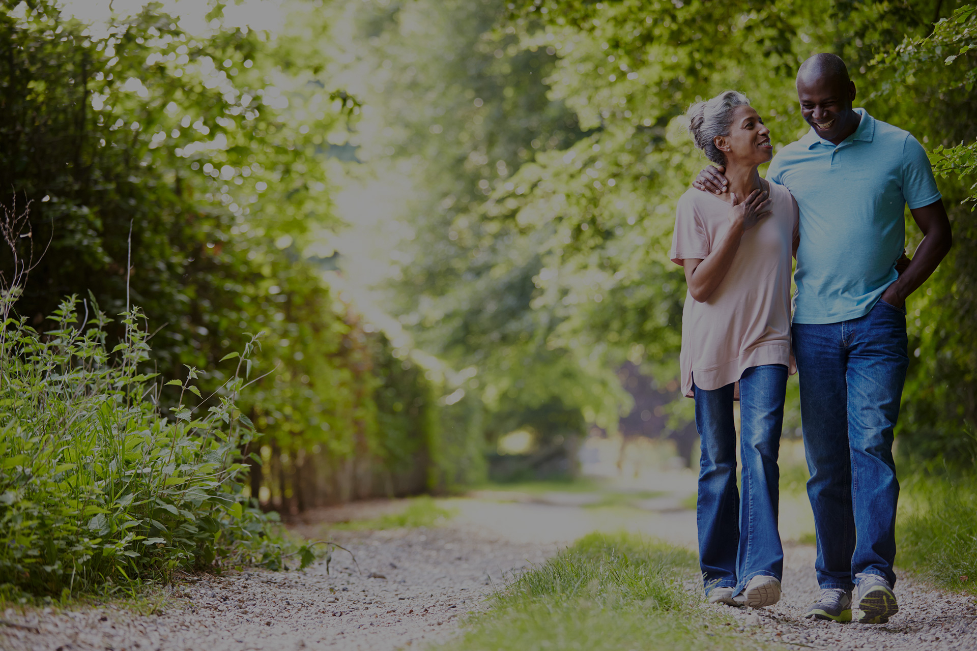 Older couple enjoying a walk outside together